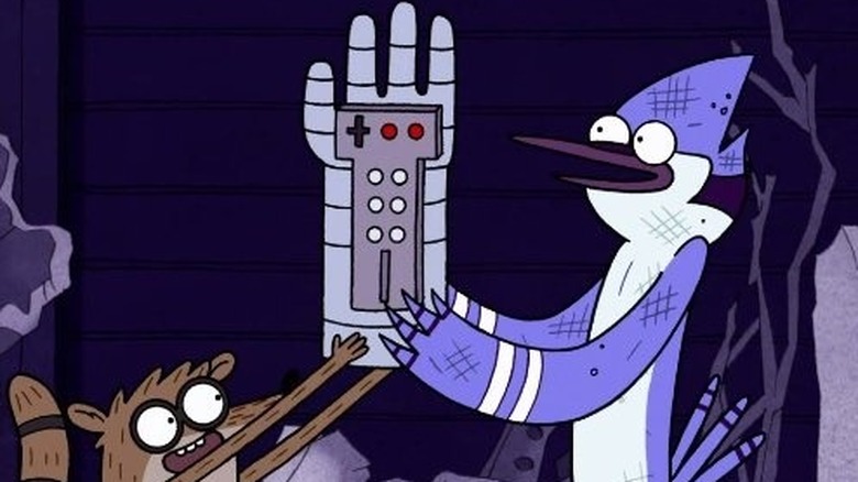 Mordecai and Rigby holding up a gaming glove on Regular Show (2010)