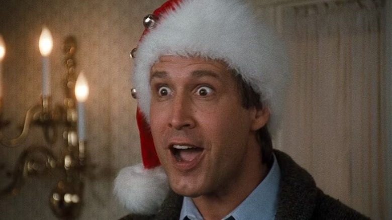 Clark Griswold wearing santa hat