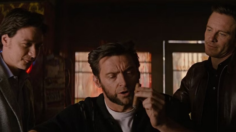 Wolverine smoking at a bar