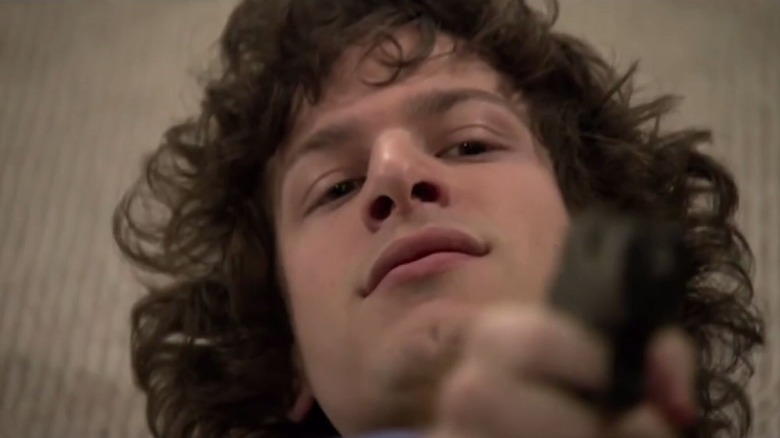 Andy Samberg holds a gun on the floor on "SNL" in 2007