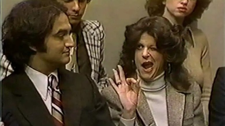 Gilda Radner as a juror flirting with John Belushi on "SNL" in 1975