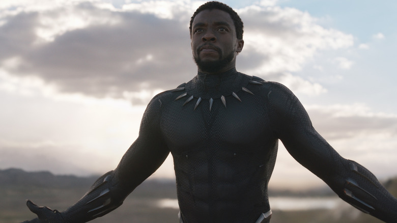 T'Challa walking with arms spread