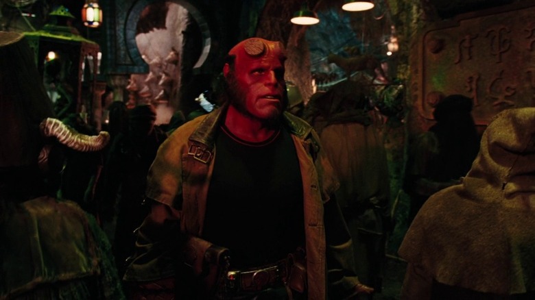 Hellboy standing in crowd