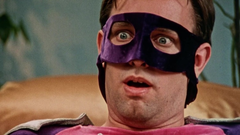 Joe Young wearing Orgazmo mask