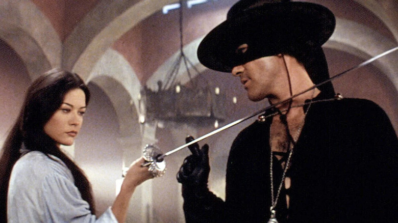 Elena rests sword on Zorro