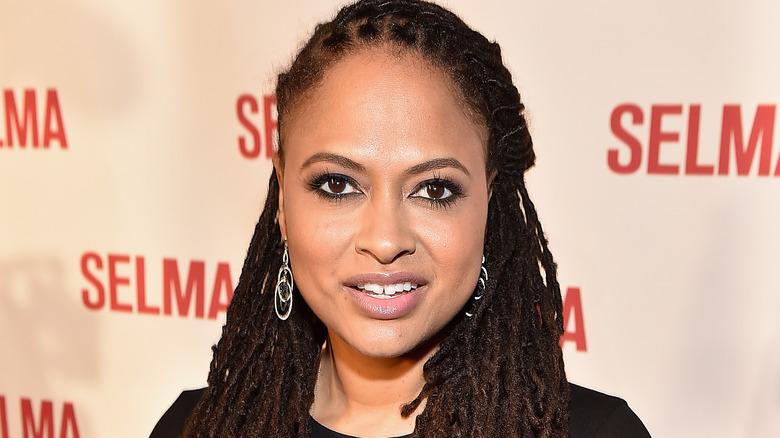 Ava DuVernay smiling on red carpet