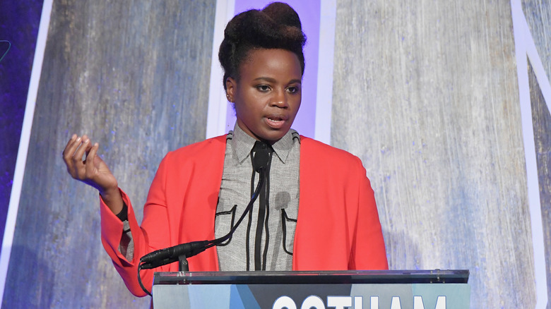 Dee Rees speaking at podium