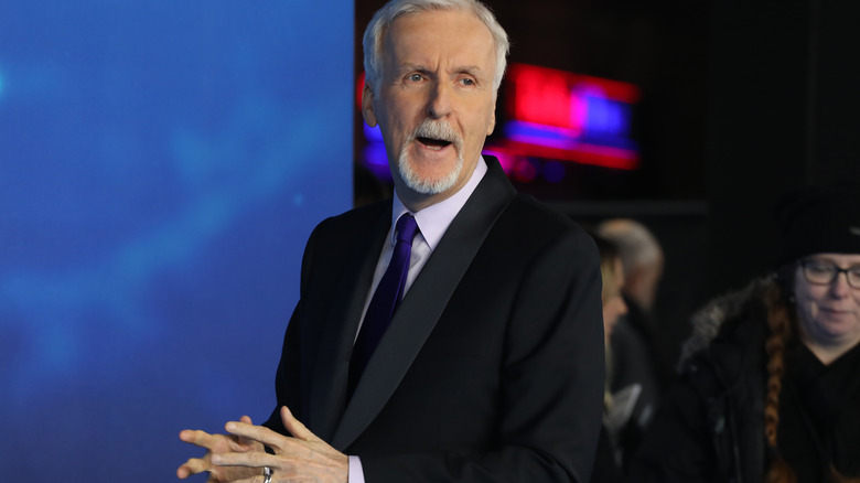 James Cameron talking and gesturing