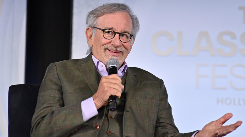 Steven Spielberg talking into microphone