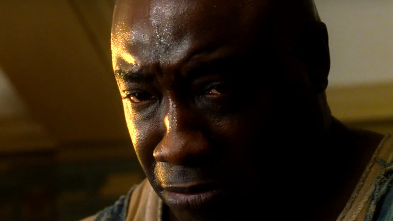 John Coffey prepares for a miracle.