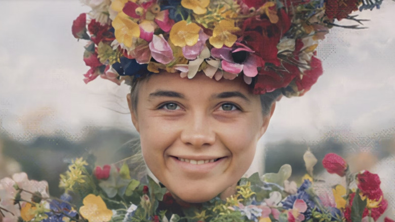 Midsommar's Dani smiling as the temple burns