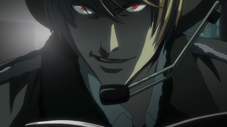 Light Yagami grinning evilly