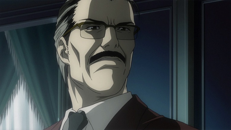 Soichiro Yagami wearing dark suit