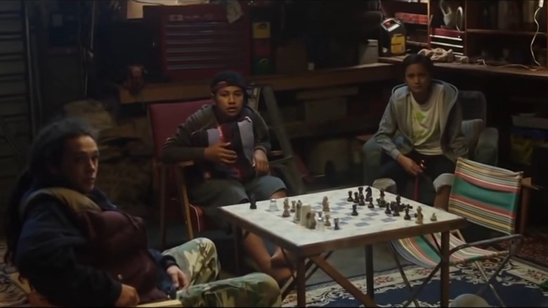 The Dark Horse cast plays chess