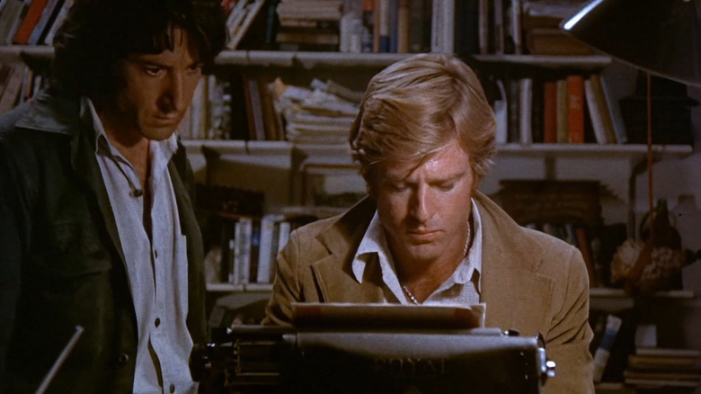 Carl and Bob looking at typewriter