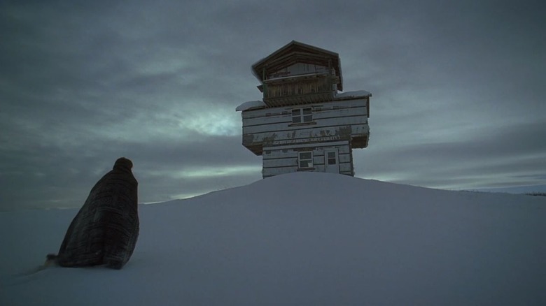 Riley Keough walks toward house