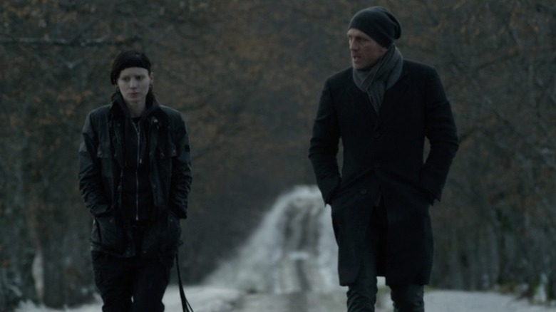 Blomkvist and Lisbeth walking together