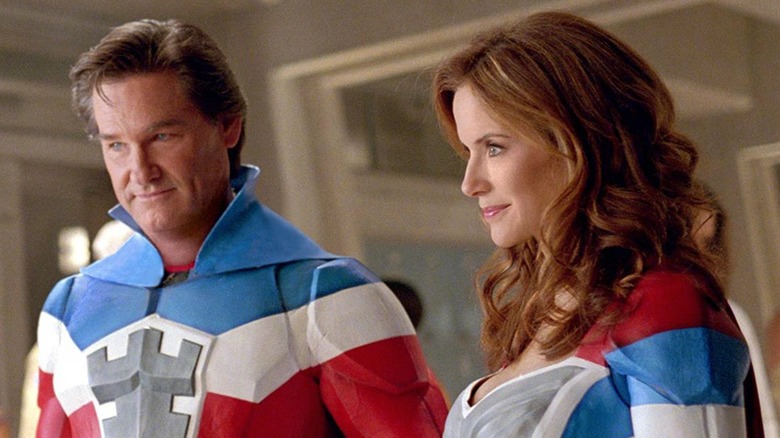 Kurt Russell and Kelly Preston in superhero costumes