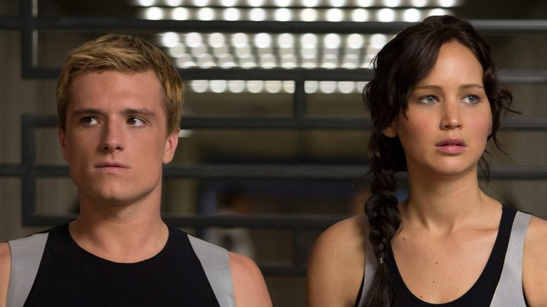 Jennifer Lawrence and Josh Hutchinson in "The Hunger Games"