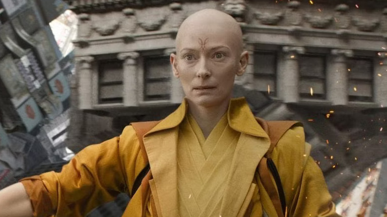 Tilda Swinton in yellow robes