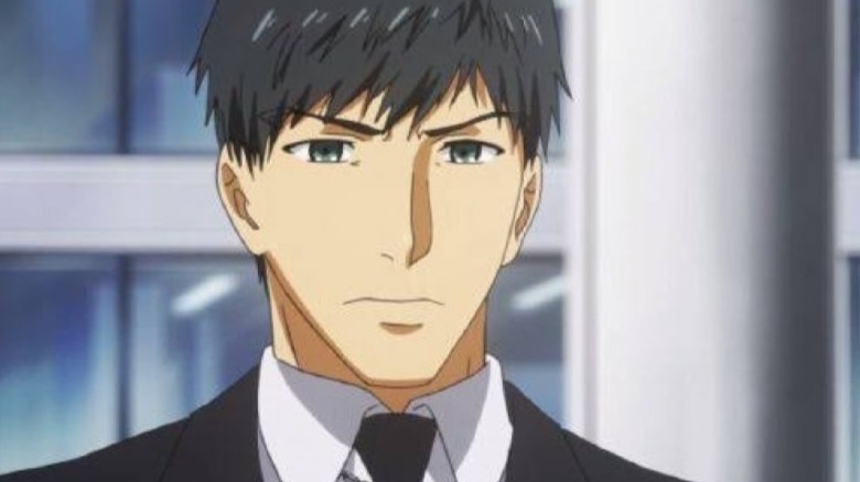 Amon Koutarou wearing a suit