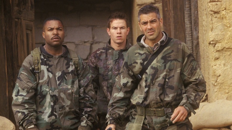 Chief Elgin, Archie, and Troy outside wearing uniforms