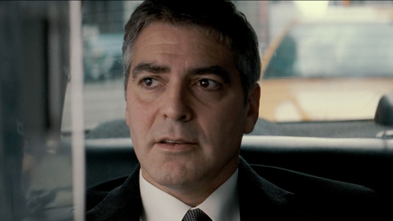 Michael Clayton in backseat