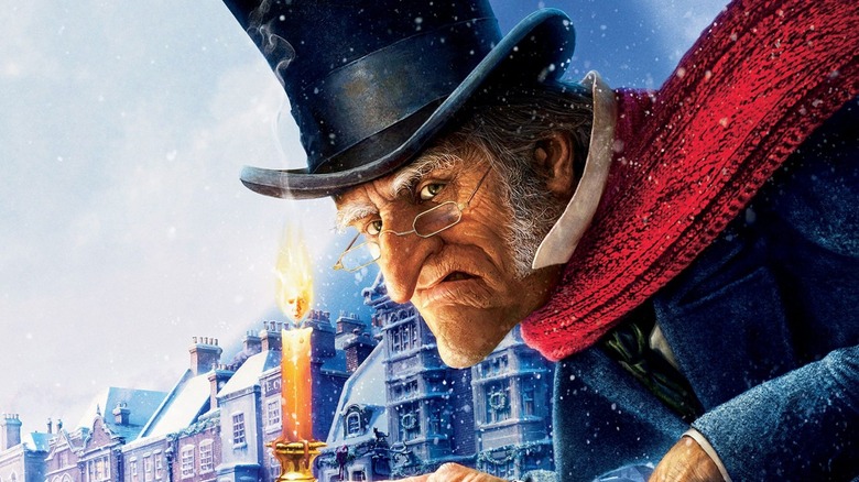 Carrey Scrooge carrying candle