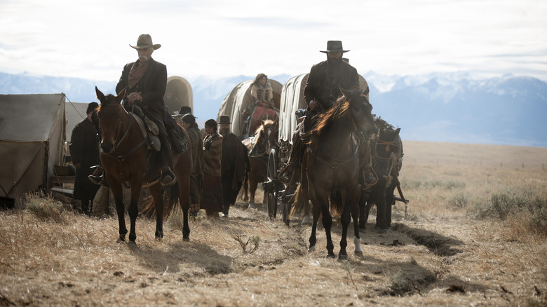 Horses pulling wagons