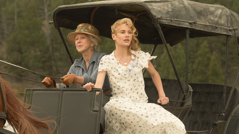 Cara and Elizabeth riding on a carriage