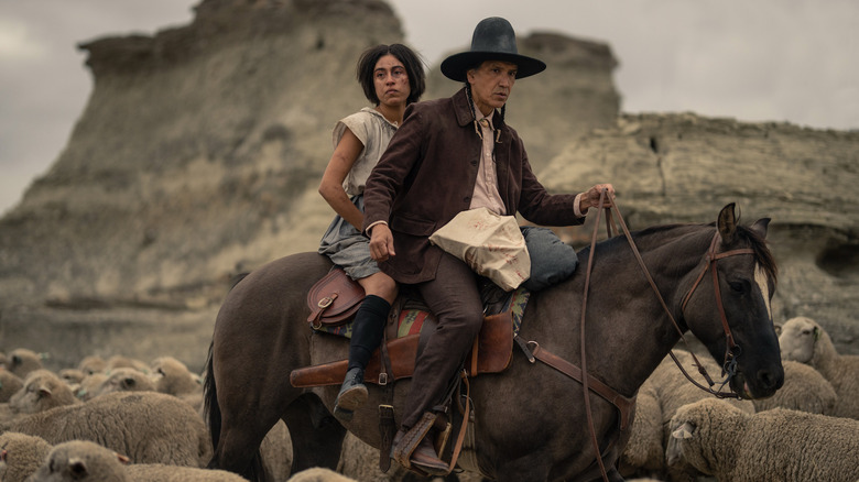 Aminah Nieves and Michael Greyeyes on horseback