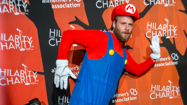 Seth Rogen posing while dressed in costume as Mario 