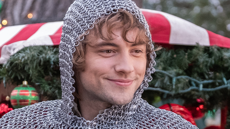 Sir Cole smiling in chainmail