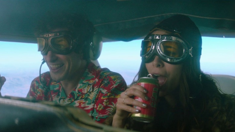 Andy Samberg and Cristin Milioti in an airplane in Palm Springs