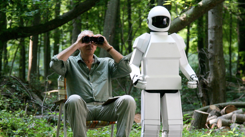 Frank Langella and Robot in the woods preparing for their next heist in Robot & Frank