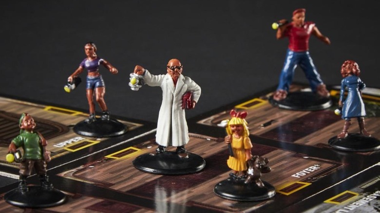 Betrayal at House figurines posing