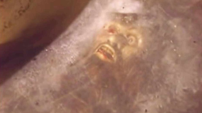 scary man frozen in ice