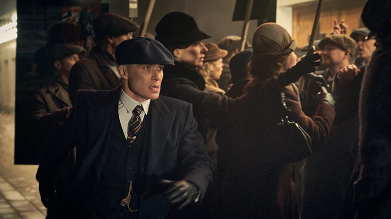 Thomas Shelby in a crowd