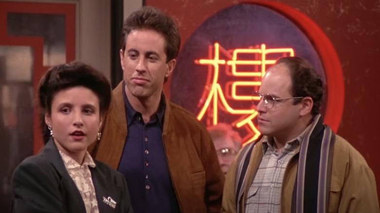 Elaine, Jerry, and George stand in Chinese restaurant