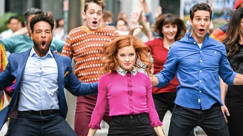 The cast of Zoey dancing on street