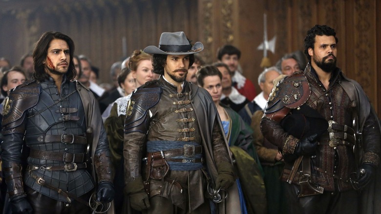 The Musketeers at attention