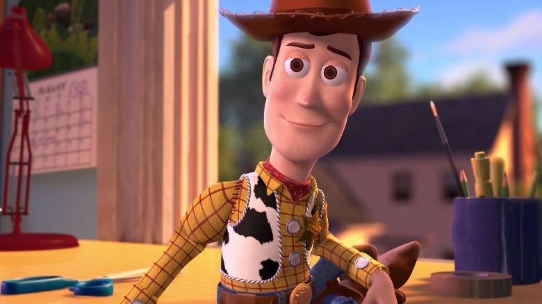 Woody warm smile sitting Toy Story