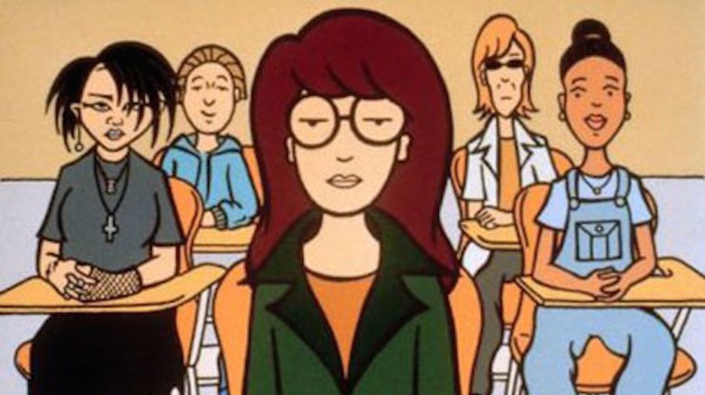 Daria sits in class