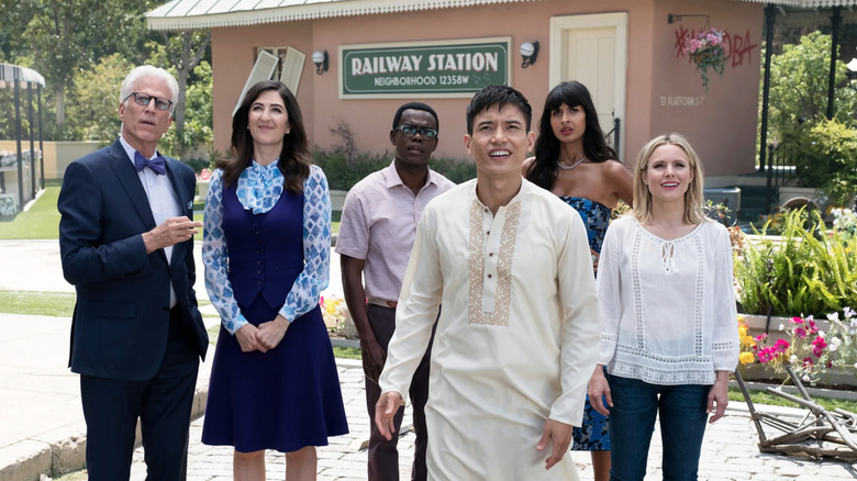 The Good Place's Team Cockroach stands