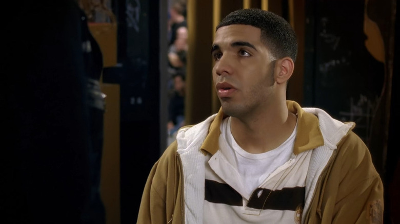 Drake looks sad in hallway