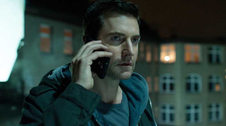 Richard Armitage speaks on the phone