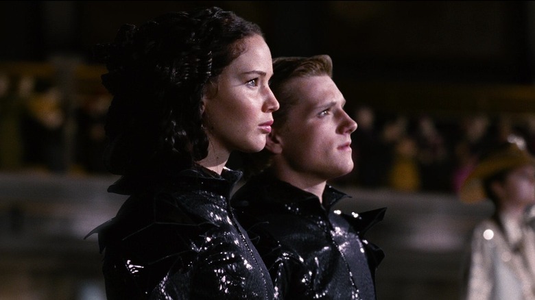 Katniss and Peeta looking intense