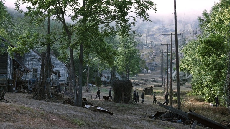 Workers walking through District 12