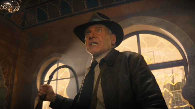 Indiana Jones raises whip