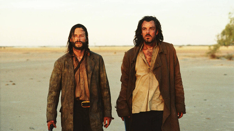 Guy Pearce and Danny Huston in The Proposition